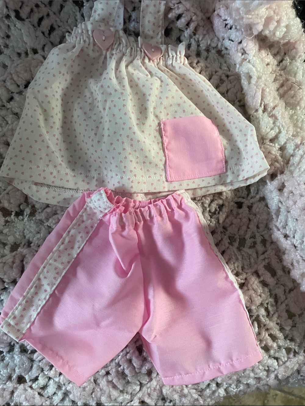Unbranded outfits, fits Baby Alive Dolls or Build A Bear. 7 Pieces.